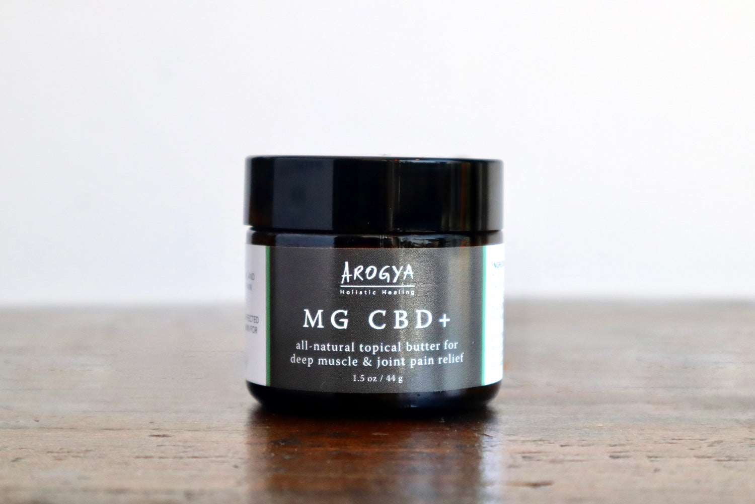 Jar of Arogya MG CBD+ topical butter for muscles and joints